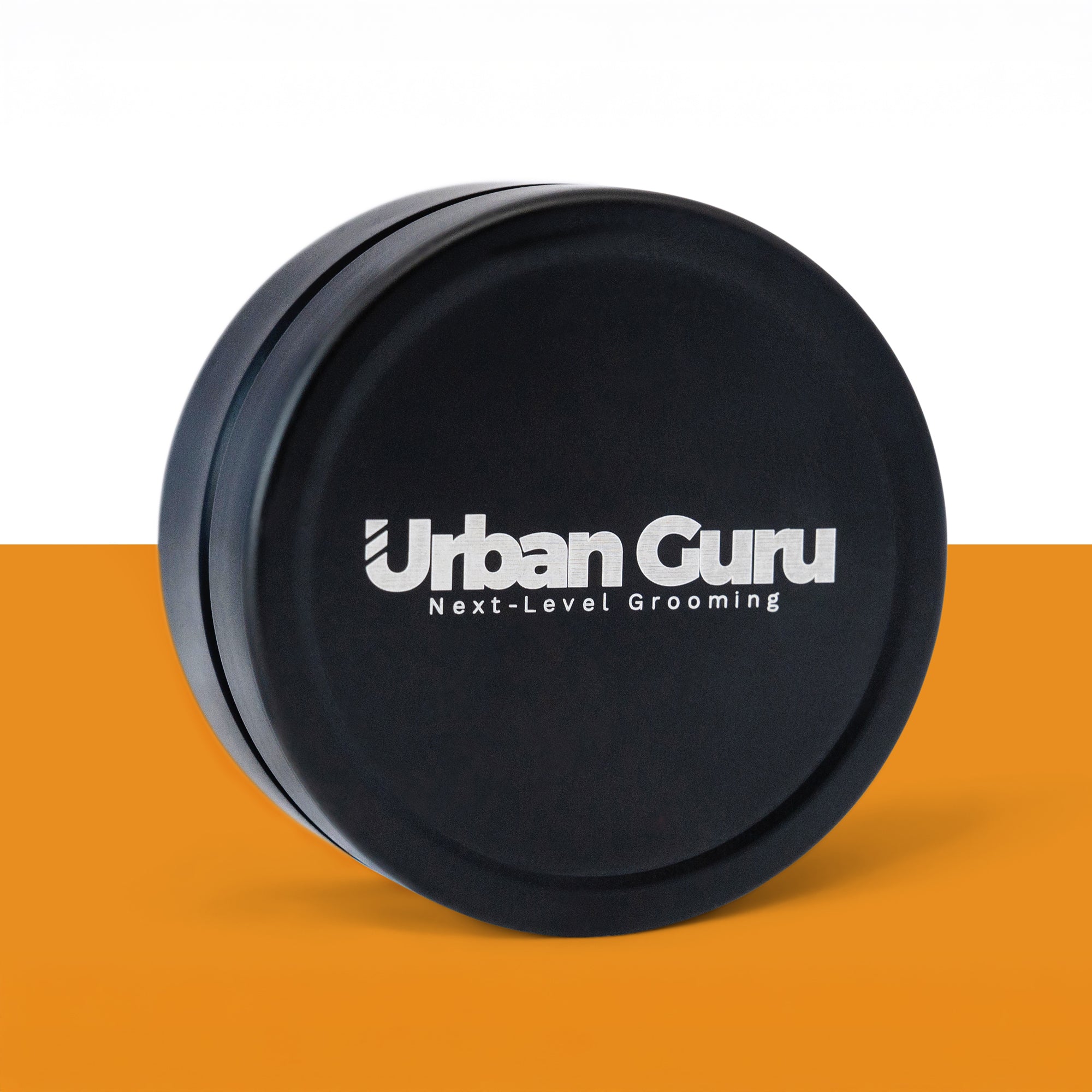 Black container lid with 'Urban Guru' branding on a two-tone background