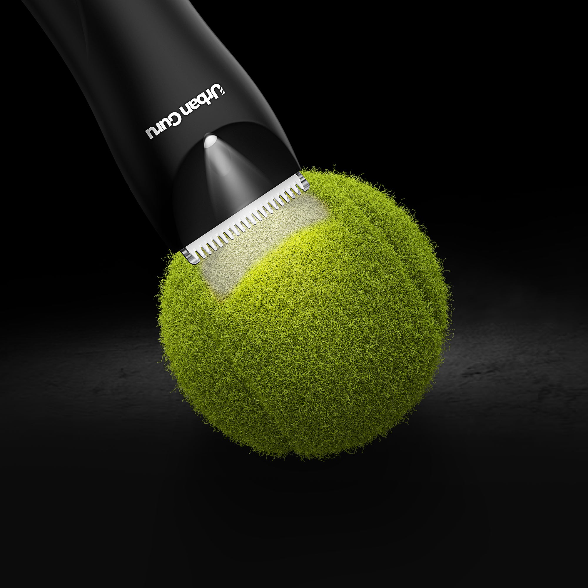 Black grooming tool with a blade on top of a green tennis ball against a black background